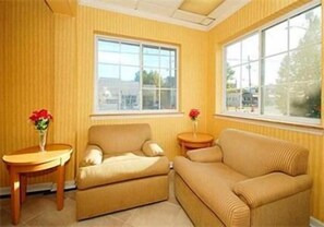 Romantic Single Room, 1 King Bed | Living room | Flat-screen TV