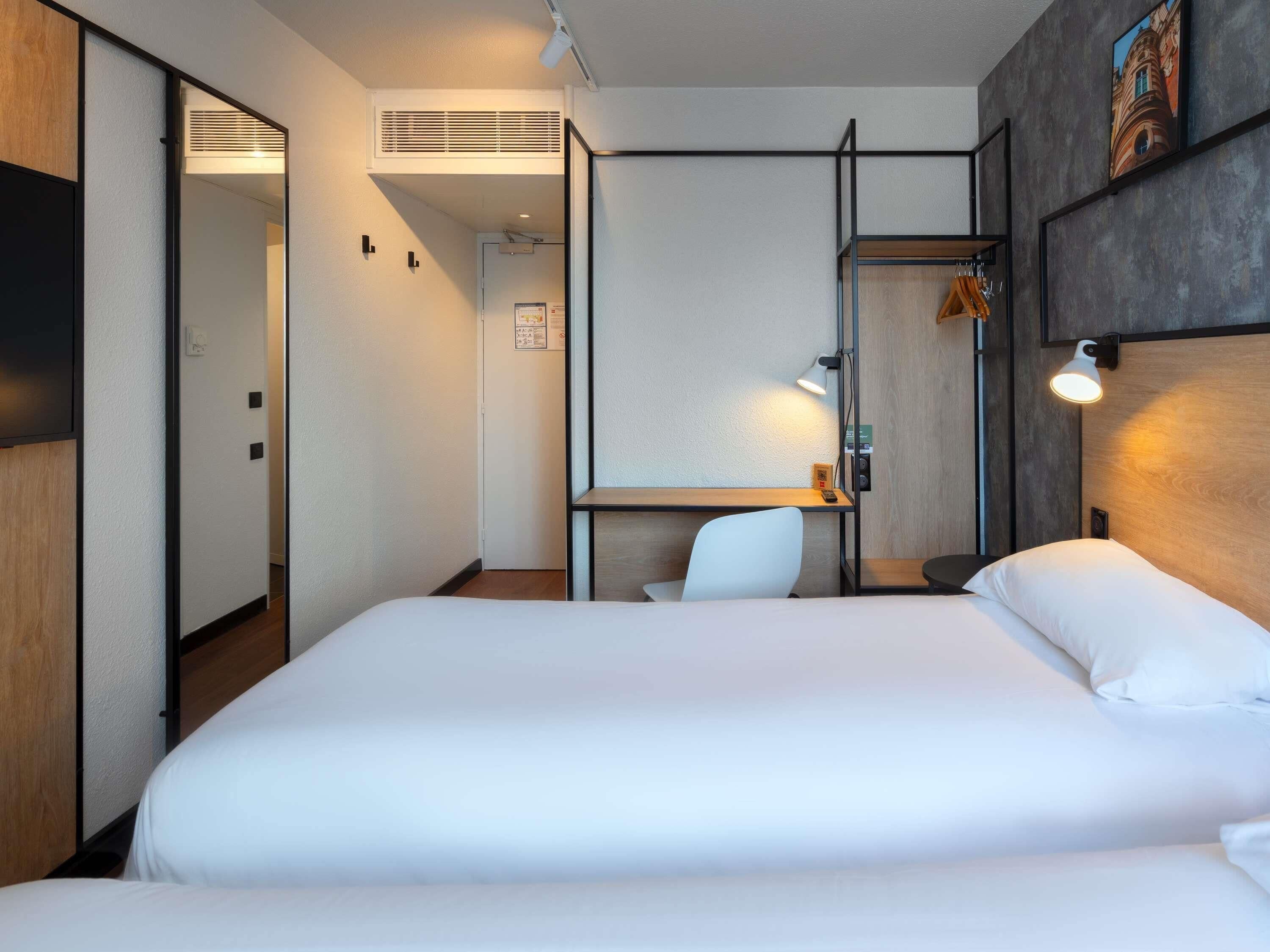 Premium bedding, desk, blackout curtains, soundproofing