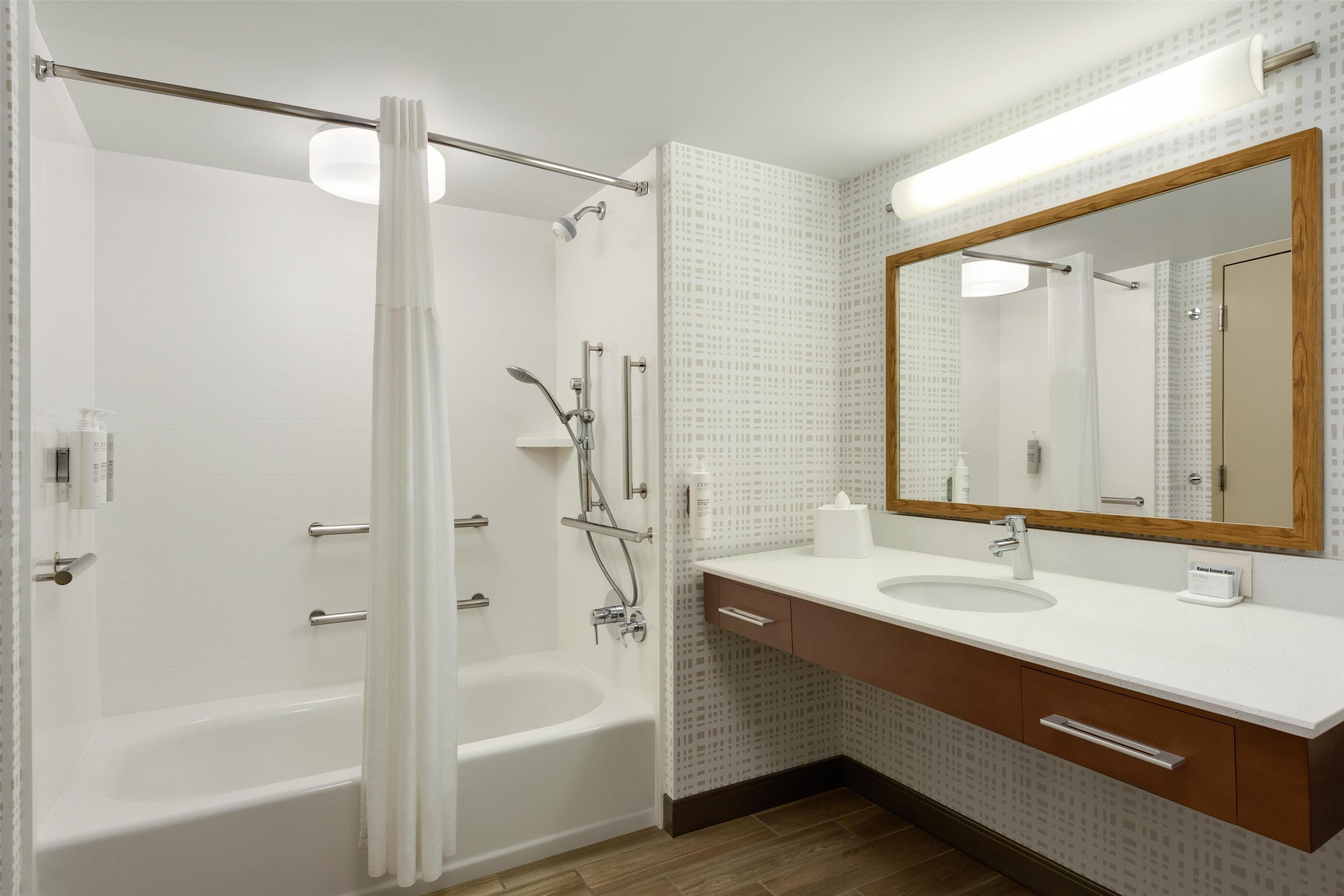 combined shower/bathtub, free toiletries, hair dryer, towels