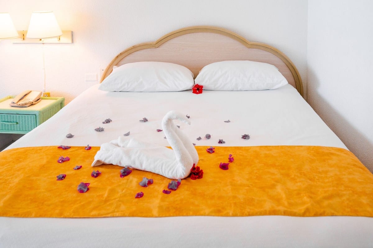 Blackout curtains, iron/ironing board (on request), bed sheets