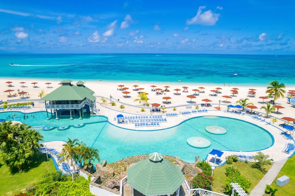 2 outdoor pools, pool umbrellas, pool loungers