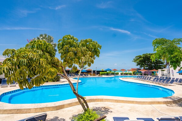 2 outdoor pools, pool umbrellas, sun loungers
