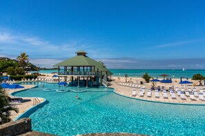 2 outdoor pools, pool umbrellas, sun loungers