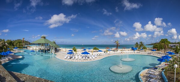 2 outdoor pools, pool umbrellas, pool loungers