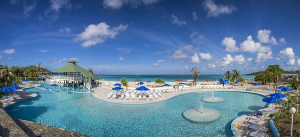 2 outdoor pools, pool umbrellas, pool loungers