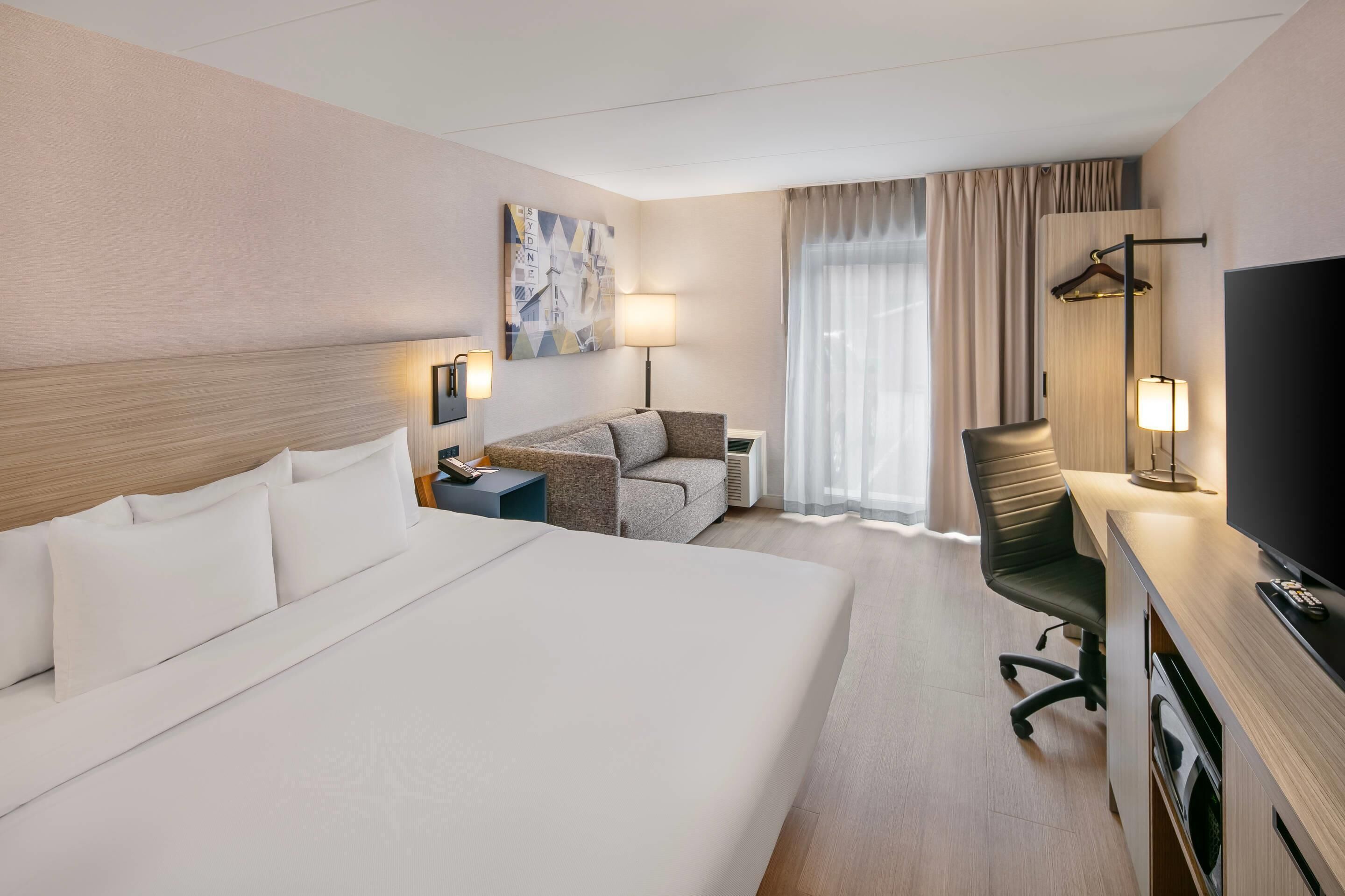 Room, 1 King Bed with Sofa bed, Non Smoking (1st Floor) | Premium bedding, in-room safe, desk, blackout curtains