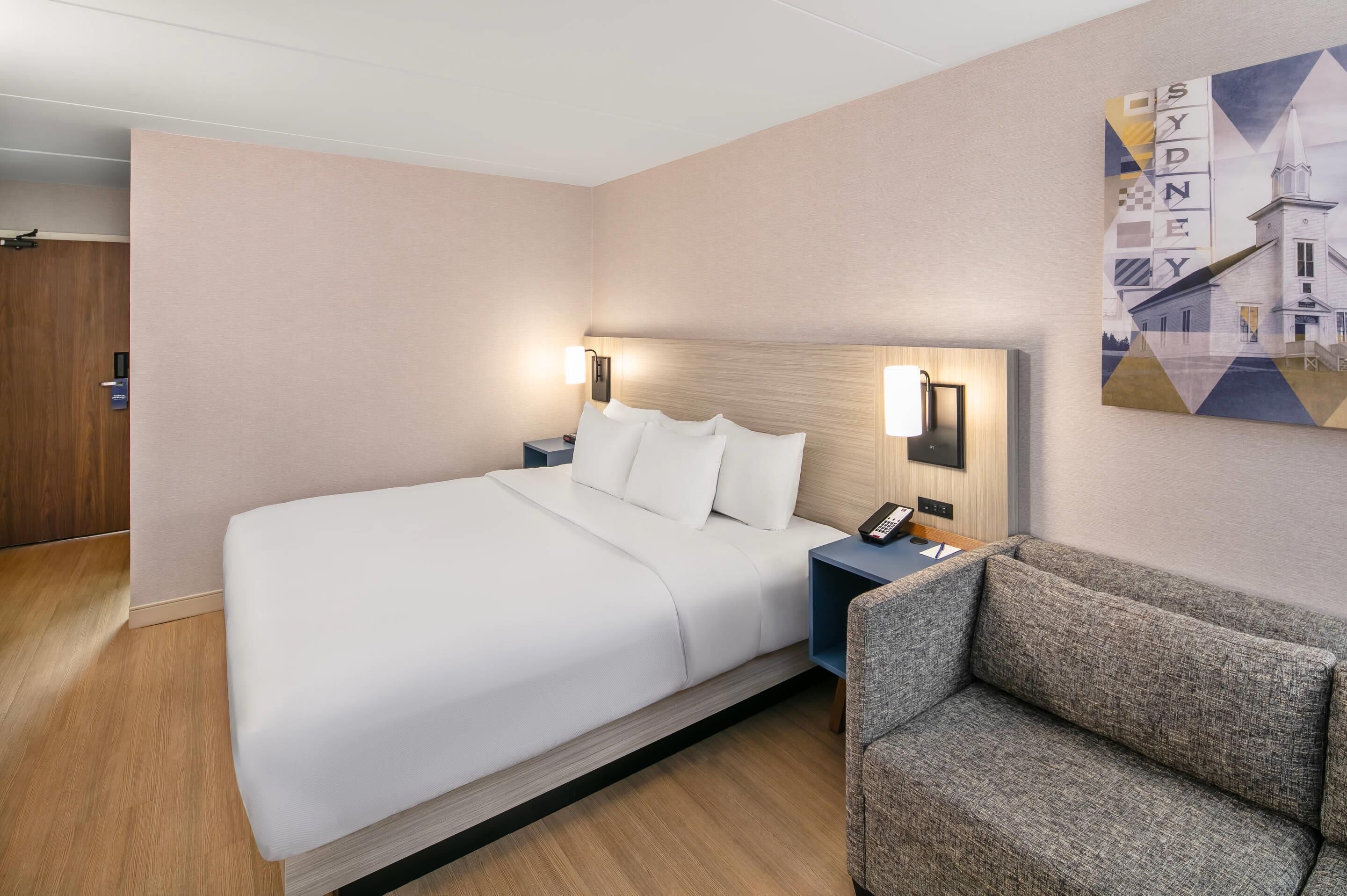 Habitación, 1 cama King size y sofá cama, para no fumadores (1st Floor) | Ropa de cama de alta calidad y caja de seguridad en la habitación 