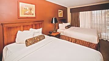 Premium bedding, desk, laptop workspace, blackout curtains