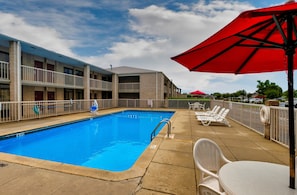 Seasonal outdoor pool, pool umbrellas, pool loungers