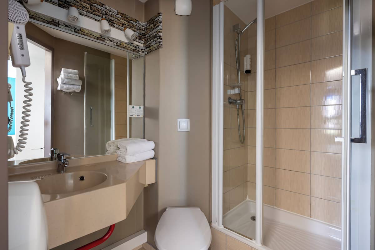 comfort triple room | bathroom | shower, free toiletries, hair dryer, towels