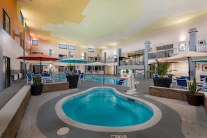 Indoor pool, open 9:00 AM to 10:00 PM, pool loungers