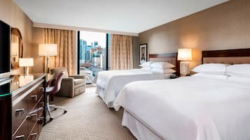 Down duvets, pillow-top beds, in-room safe, desk