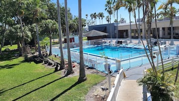 Outdoor pool, open 9:00 AM to 6:00 PM, pool umbrellas, pool loungers