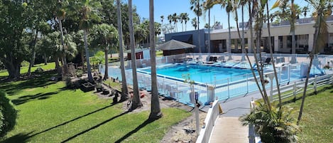 Outdoor pool, open 9:00 AM to 6:00 PM, pool umbrellas, sun loungers