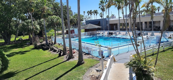 Outdoor pool, open 9:00 AM to 6:00 PM, pool umbrellas, sun loungers