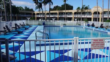 Outdoor pool, open 9:00 AM to 6:00 PM, pool umbrellas, sun loungers
