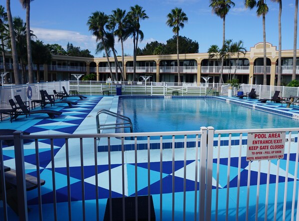 Outdoor pool, open 9:00 AM to 6:00 PM, pool umbrellas, sun loungers