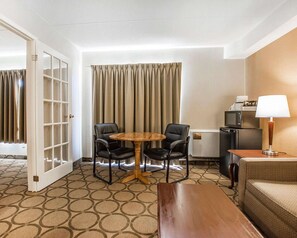 Premium bedding, pillow-top beds, desk, laptop workspace