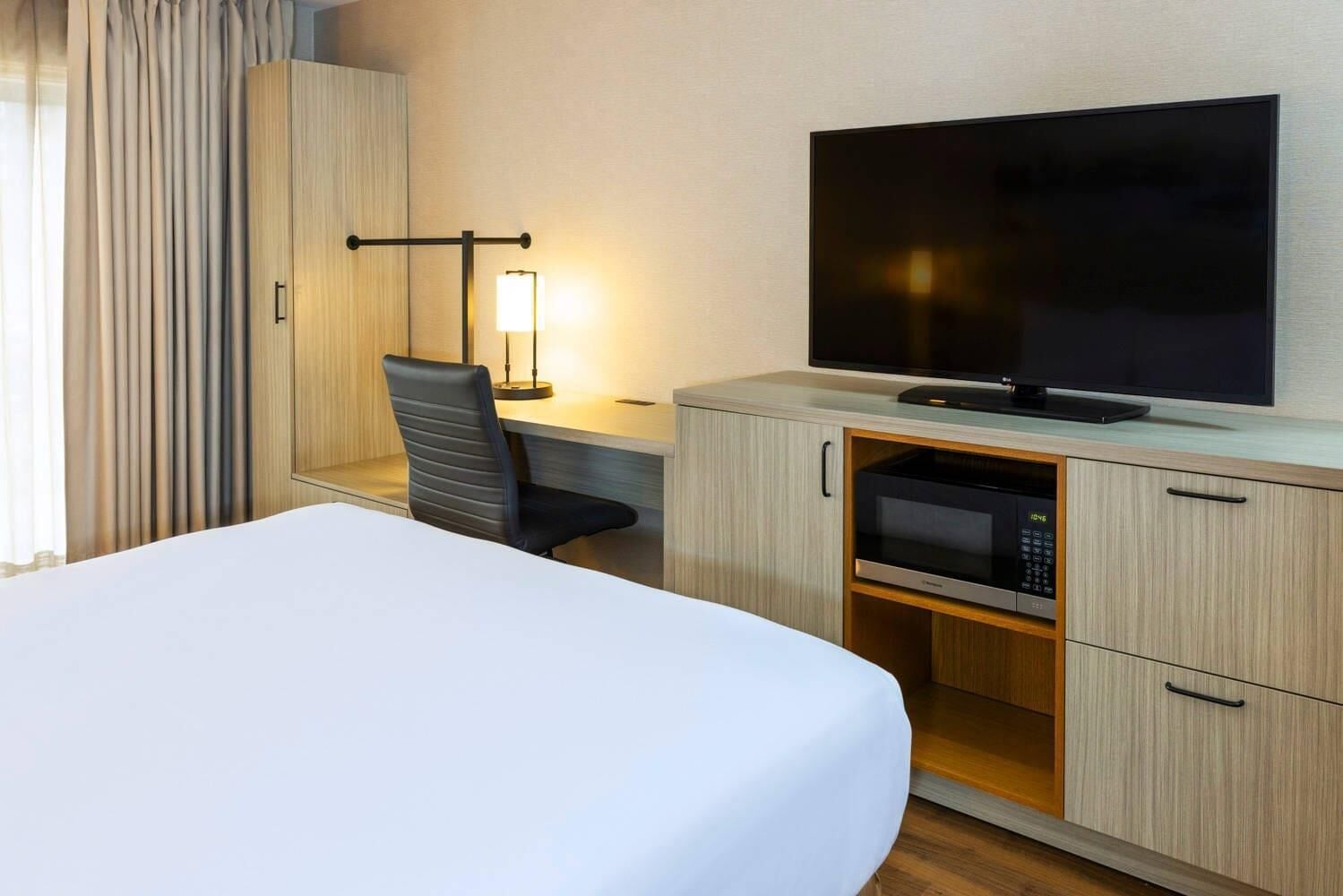 Premium bedding, pillowtop beds, desk, laptop workspace