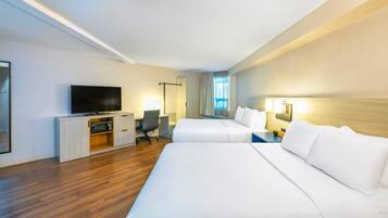 Premium bedding, pillowtop beds, desk, laptop workspace