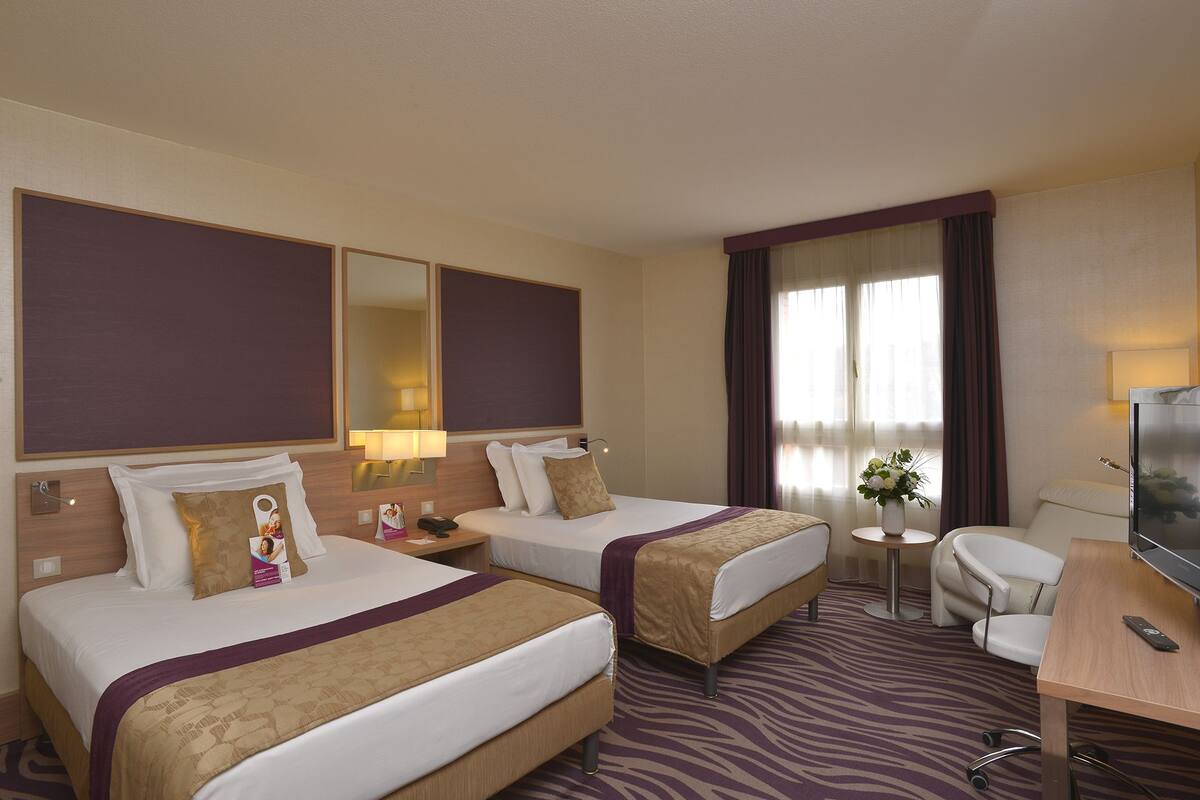 Premium bedding, minibar, in-room safe, laptop workspace
