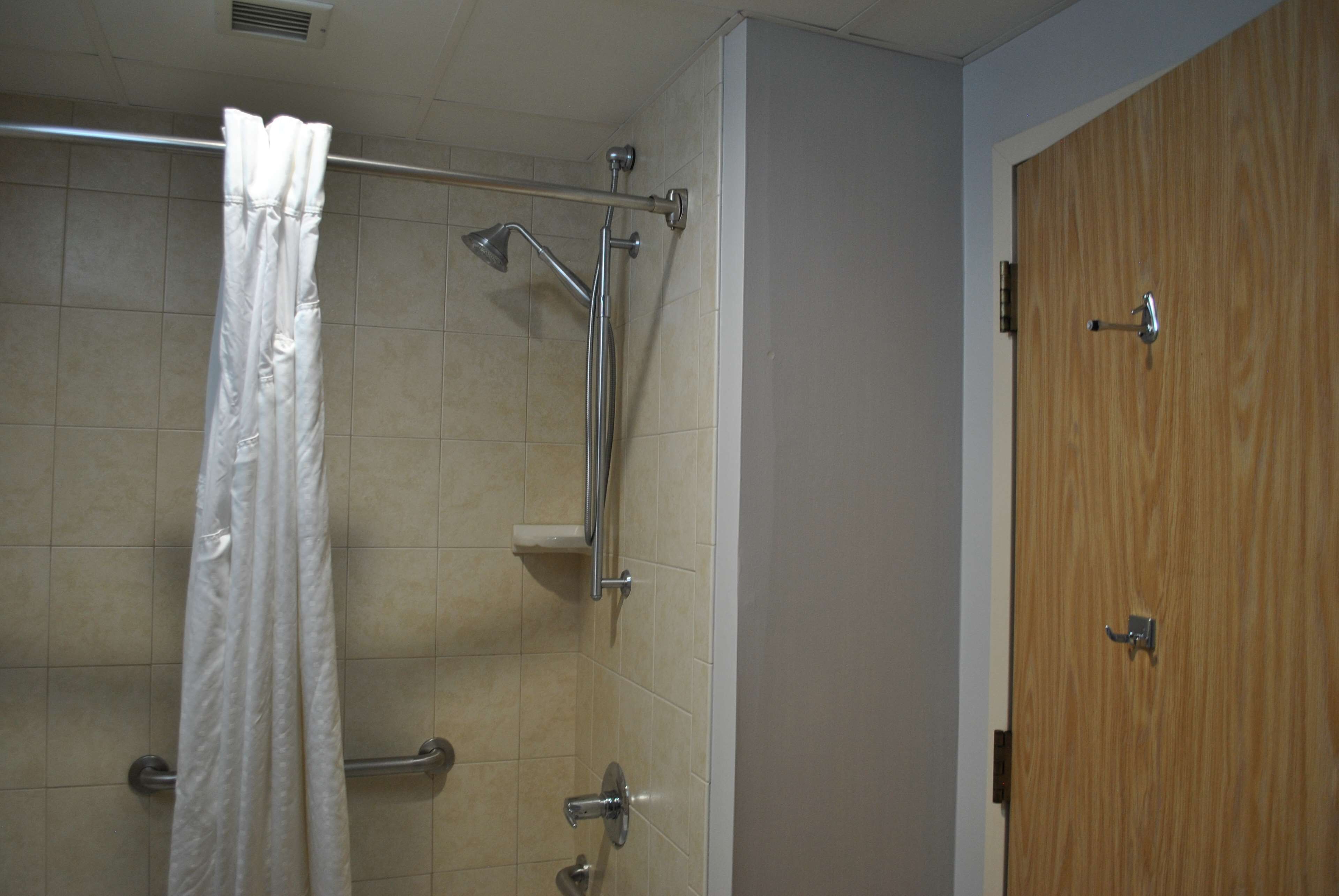 standard room, 2 double beds, accessible, refrigerator & microwave | bathroom | shower, hair dryer, towels