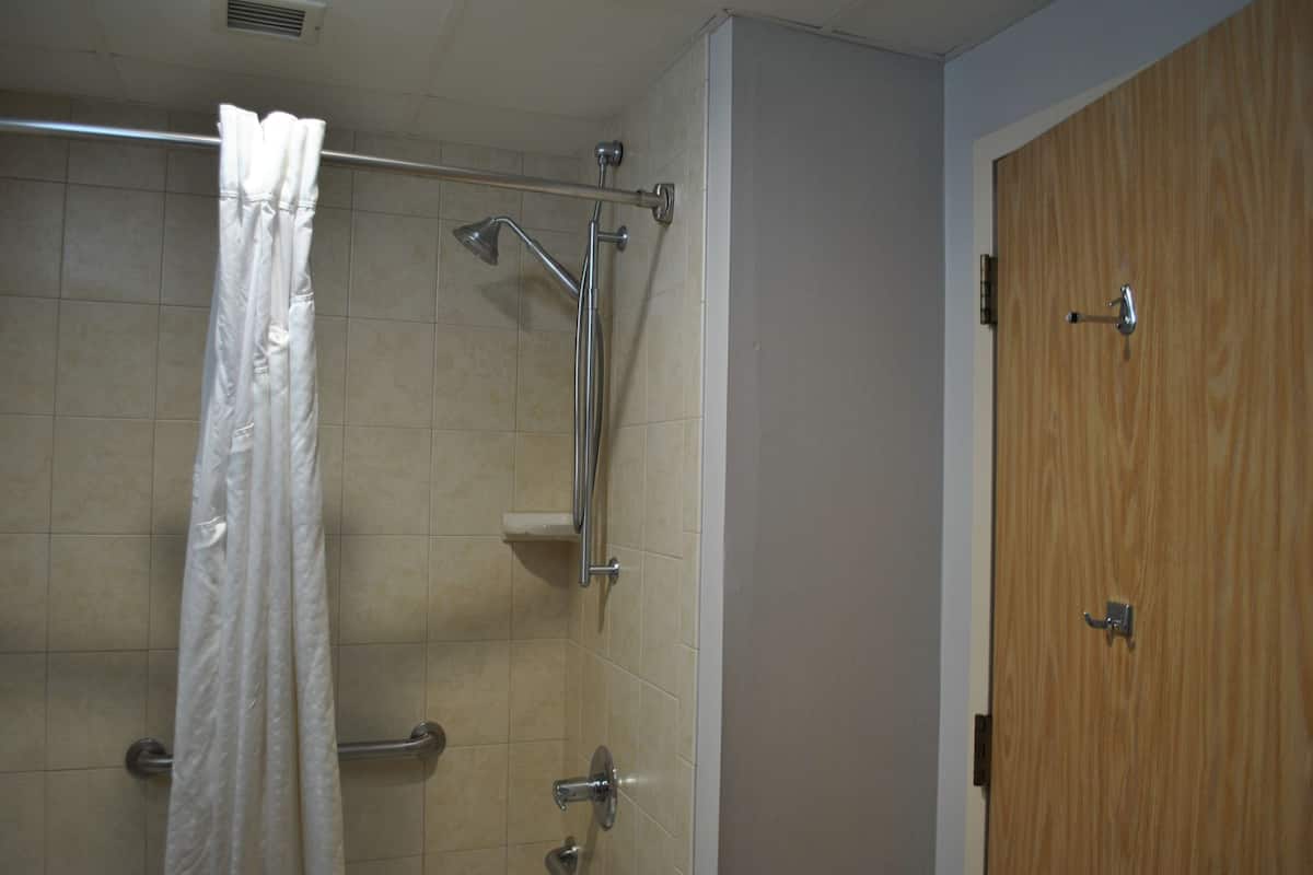 standard room, 2 double beds, accessible, refrigerator & microwave | bathroom | shower, hair dryer, towels