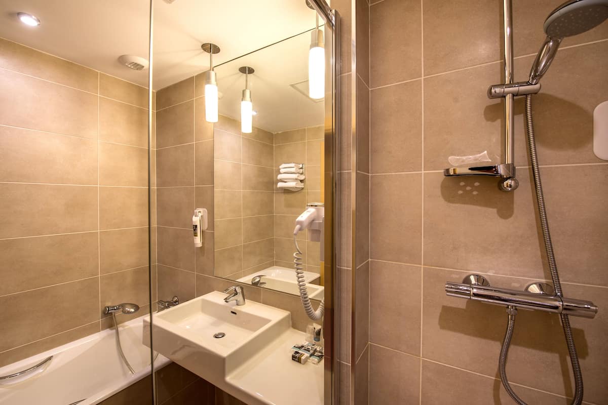 Eco-friendly toiletries, hair dryer, towels