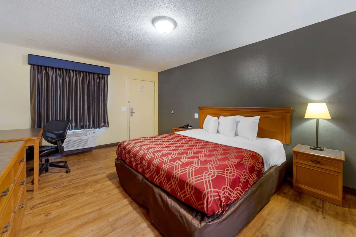Ropa de cama de alta calidad y tabla de planchar con plancha