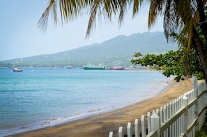 On the beach, black sand, beach massages, beach bar