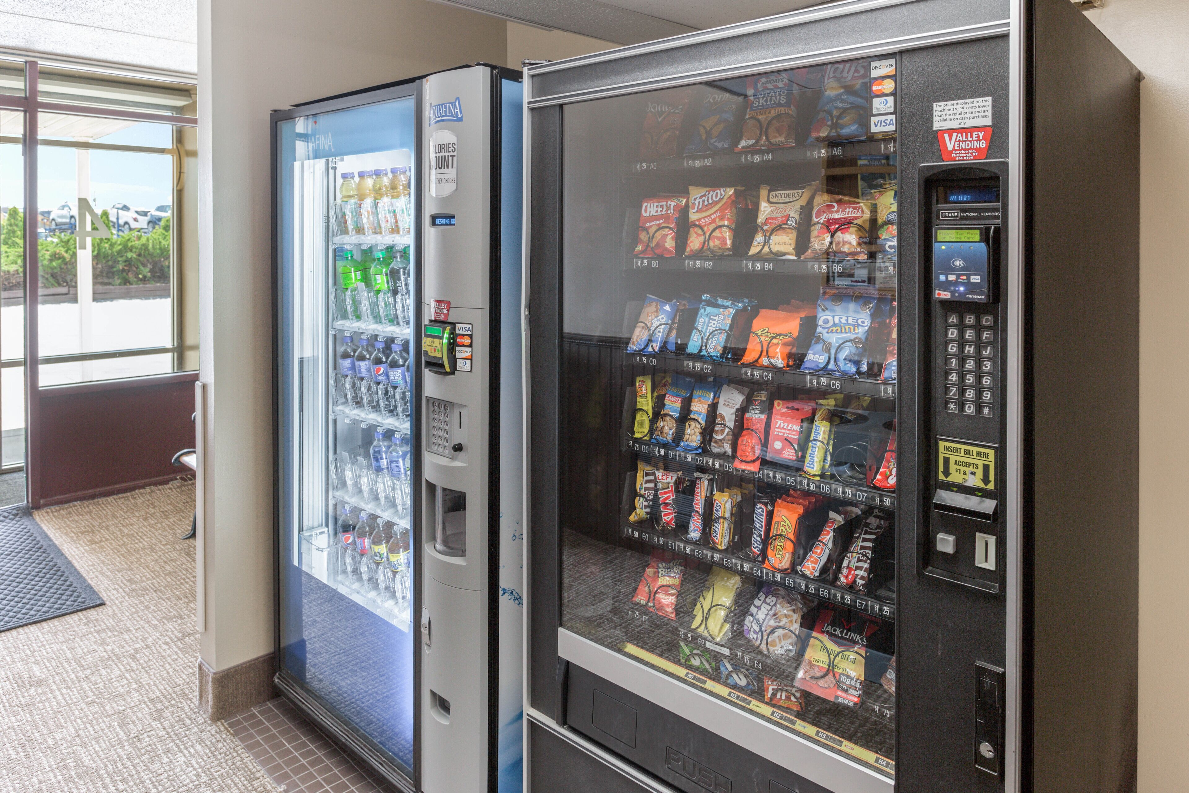 A vending machine with snacks and a drink dispenser.