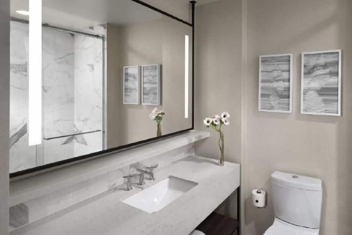 Bathroom | Shower, designer toiletries, hair dryer, bathrobes