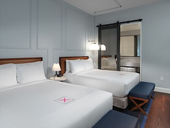 Room, 2 Queen Beds (Meta) | Premium bedding, pillowtop beds, in-room safe, desk at Axiom Hotel