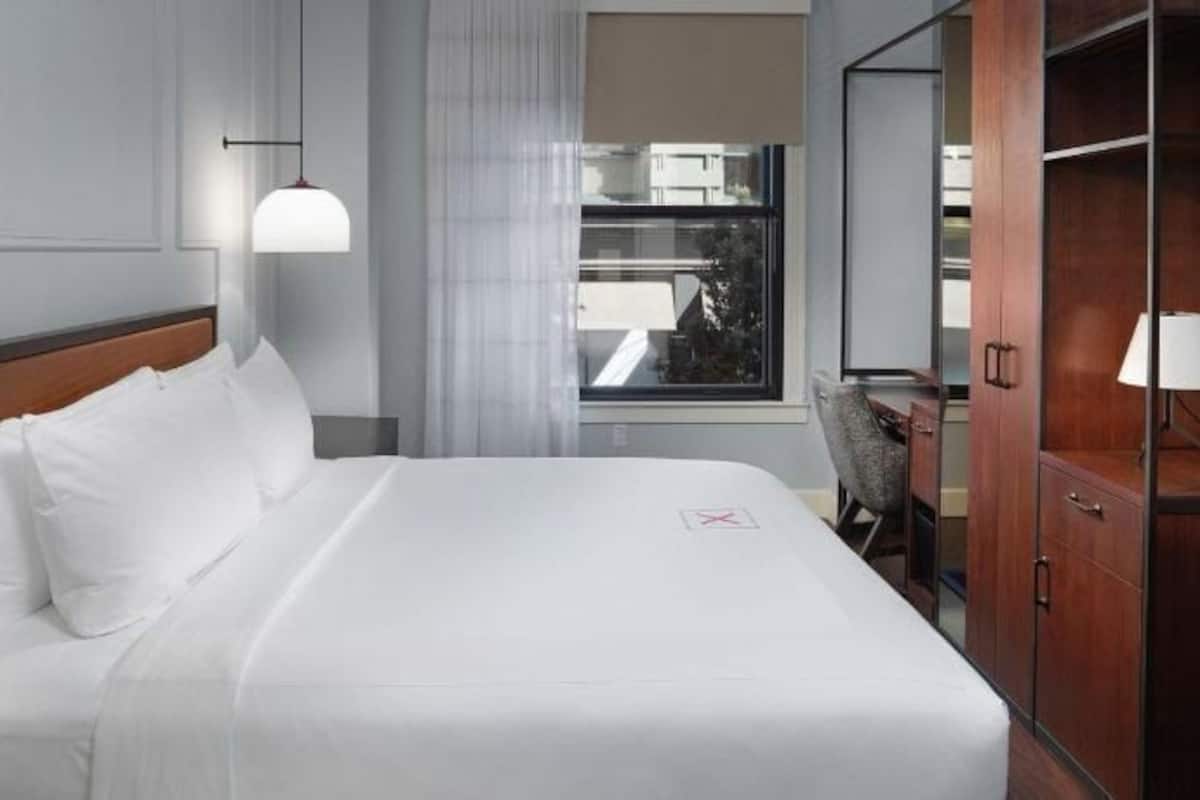 Roupas de cama premium, edredons de pluma, camas com colchões pillow-top