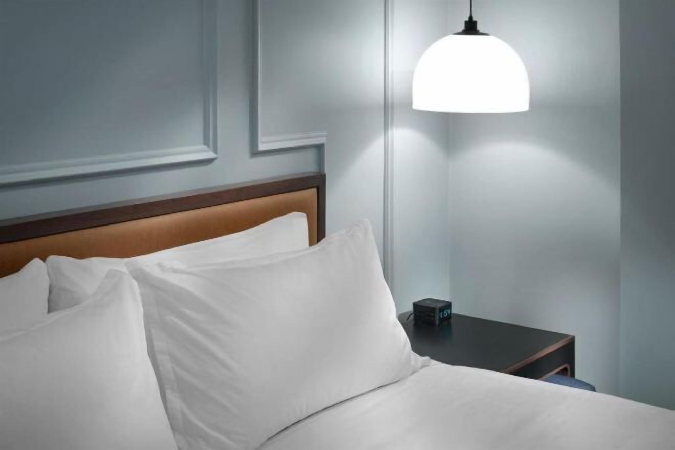 Premium bedding, down comforters, pillowtop beds, in-room safe