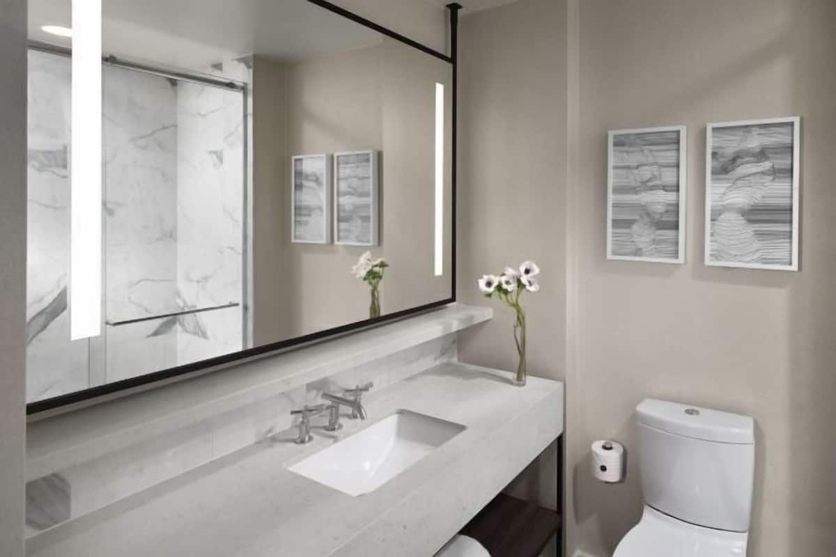 Bathroom | Shower, designer toiletries, hair dryer, bathrobes