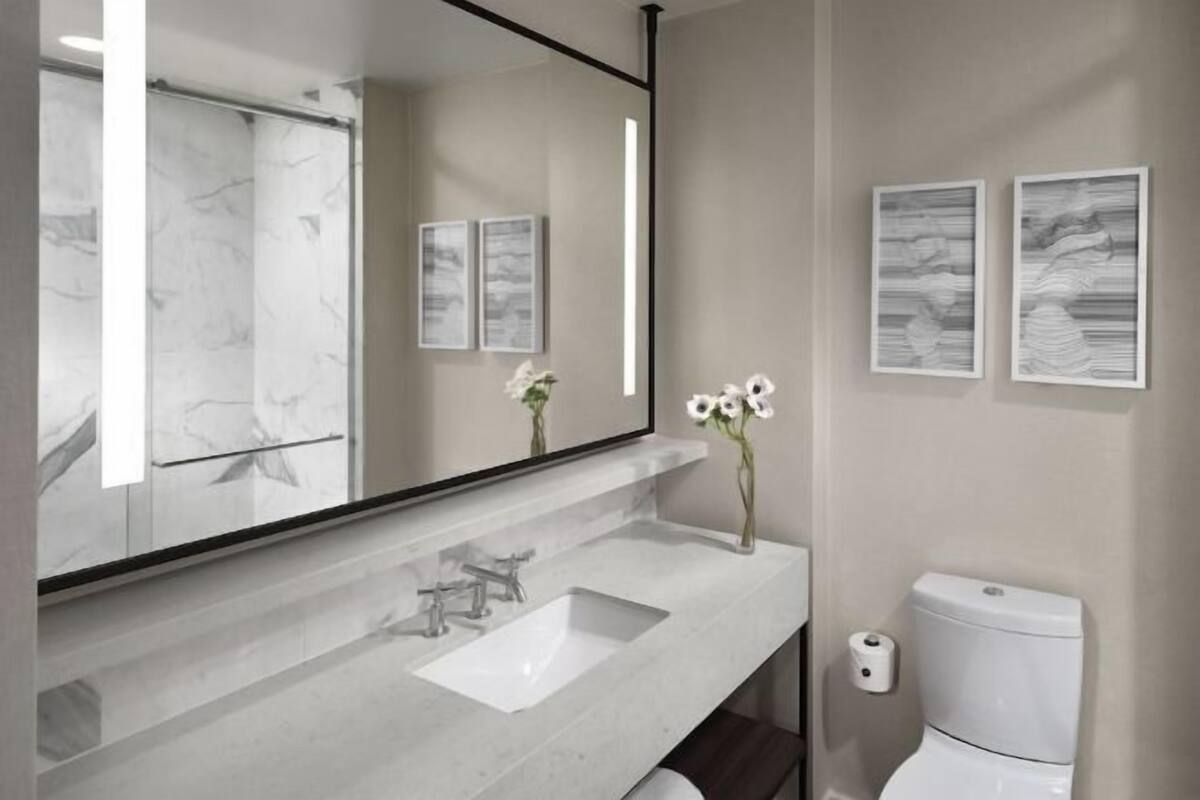 Bathroom | Shower, designer toiletries, hair dryer, bathrobes