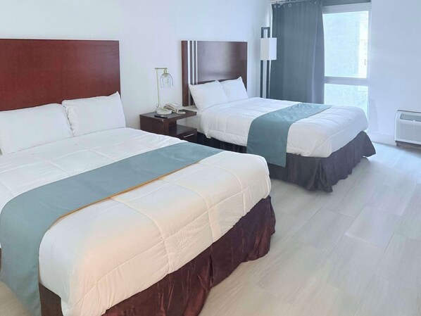 Standard Room, 2 Queen Beds, Non Smoking | Desk, iron/ironing board, free WiFi, bed sheets