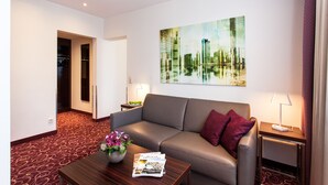 Deluxe Suite | Living area | LCD TV