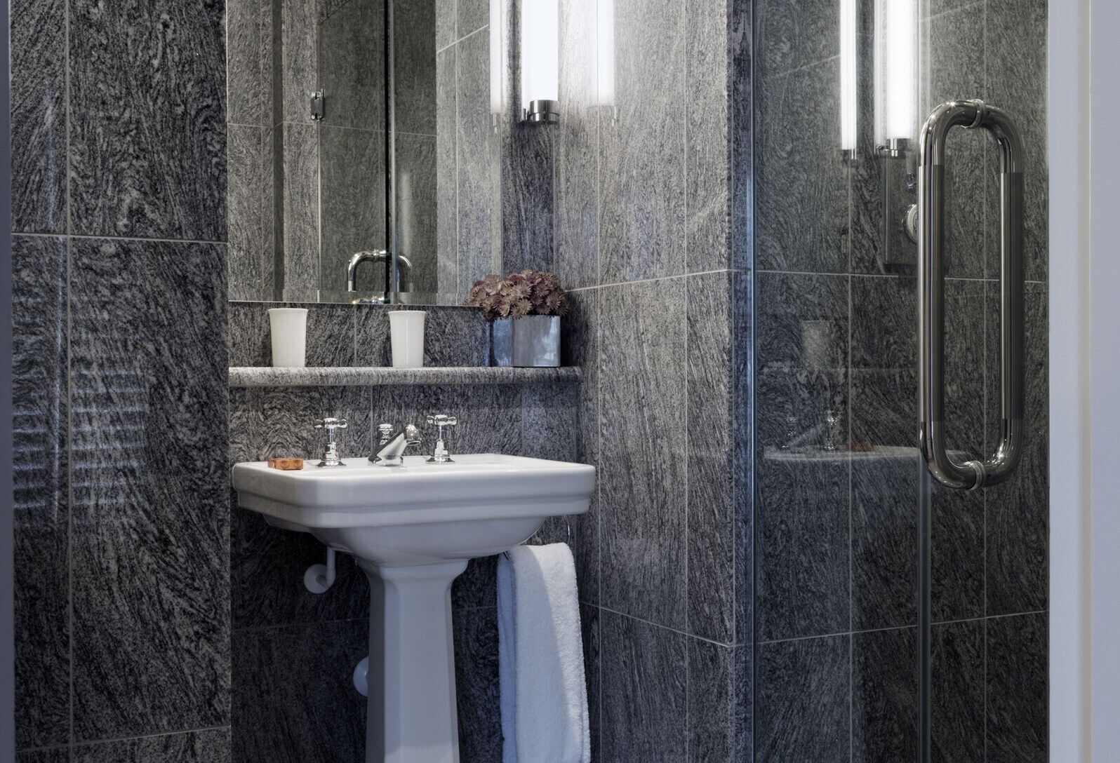 accessible deluxe king room | bathroom | shower, designer toiletries, hair dryer, bathrobes