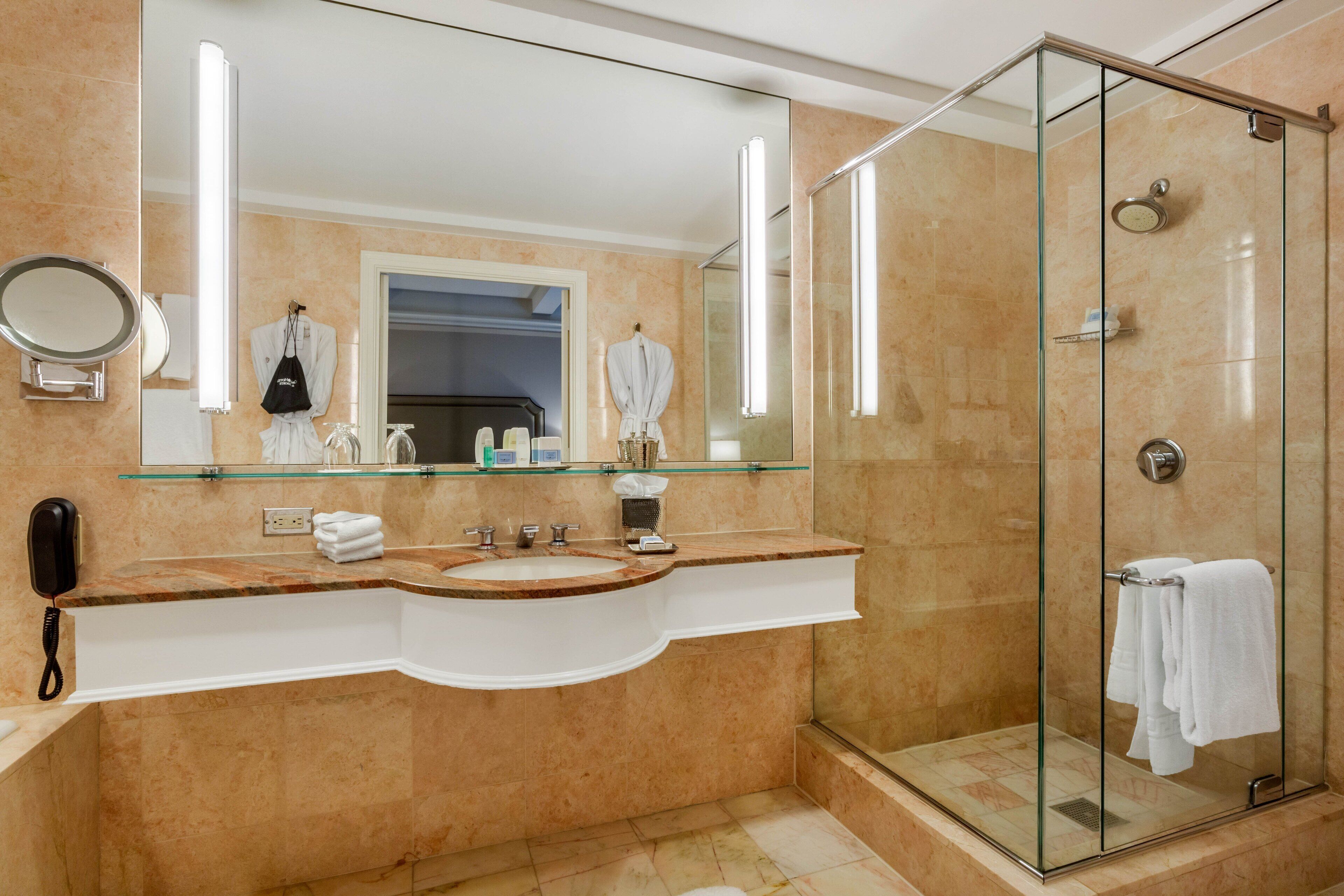Shower, hair dryer, bathrobes, towels