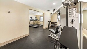 A gym with treadmills, weight machines, and dumbbells. - Best Western Rochester Marketplace Inn (Rochester)