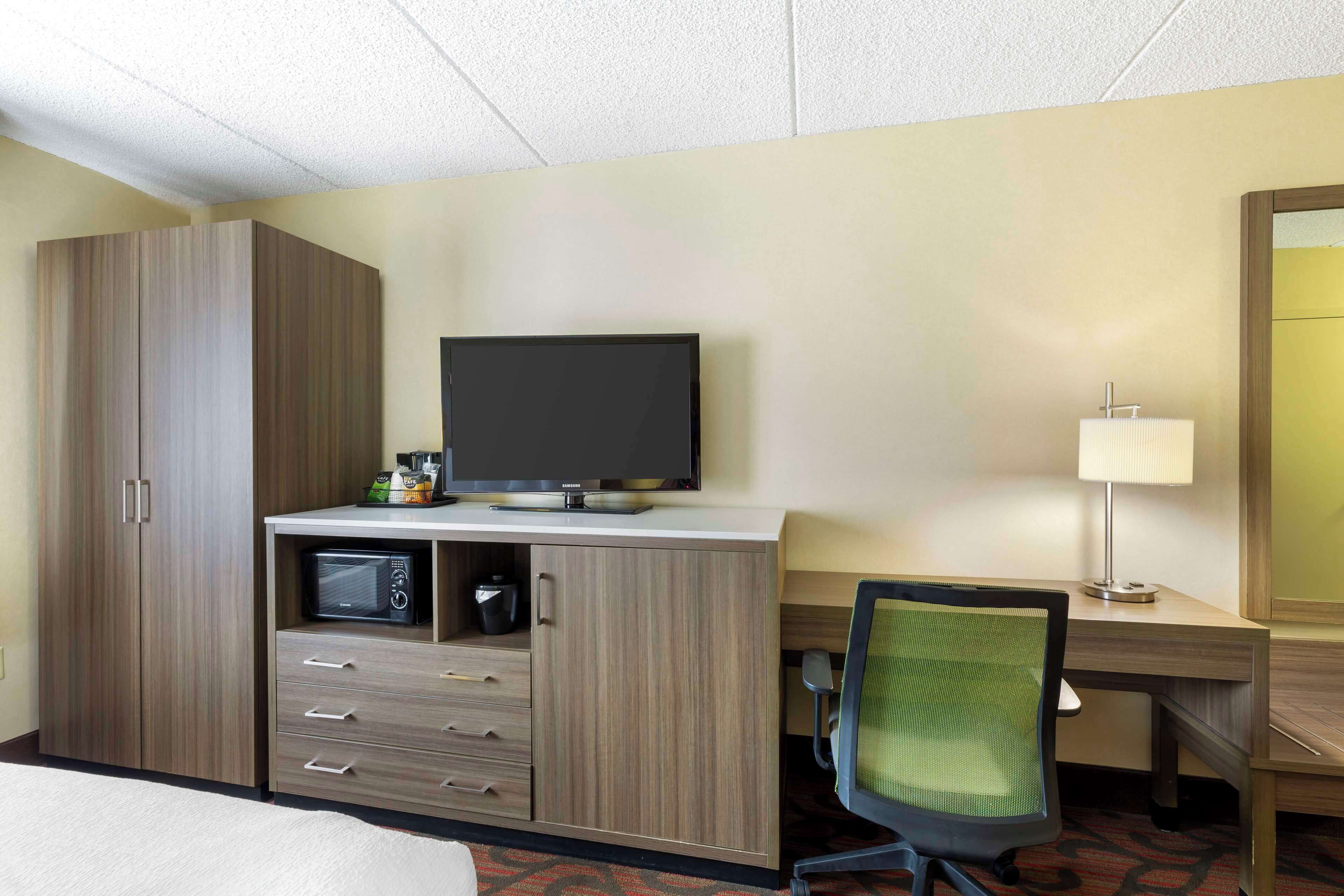 standard room, 2 queen beds, non smoking, refrigerator & microwave | individually decorated, individually furnished, desk, laptop workspace