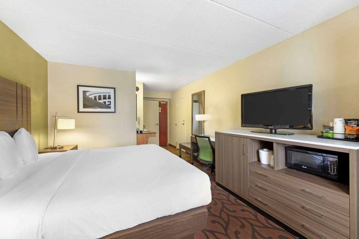 Desk, laptop workspace, iron/ironing board, cots/infant beds