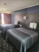 Cortinas blackout, tabla de planchar con plancha y wifi gratis