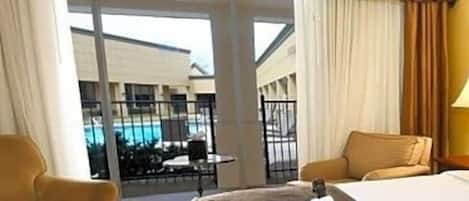 Premium bedding, desk, blackout drapes, iron/ironing board