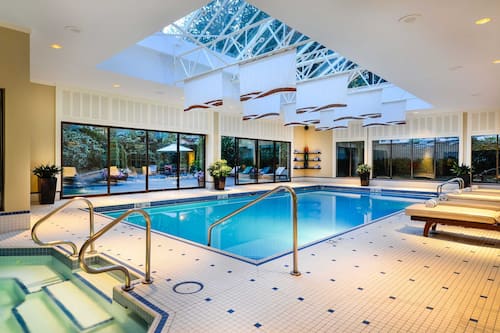 Indoor pool, open 6:30 AM to 10:00 PM, pool loungers