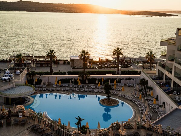 Indoor pool, 2 outdoor pools, pool umbrellas, pool loungers