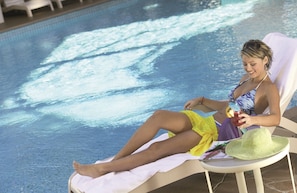 Seasonal outdoor pool, pool loungers