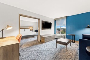 Suite, 1 King Bed (Bath Walk-In Shower) | In-room safe, desk, iron/ironing board, free cots/infant beds